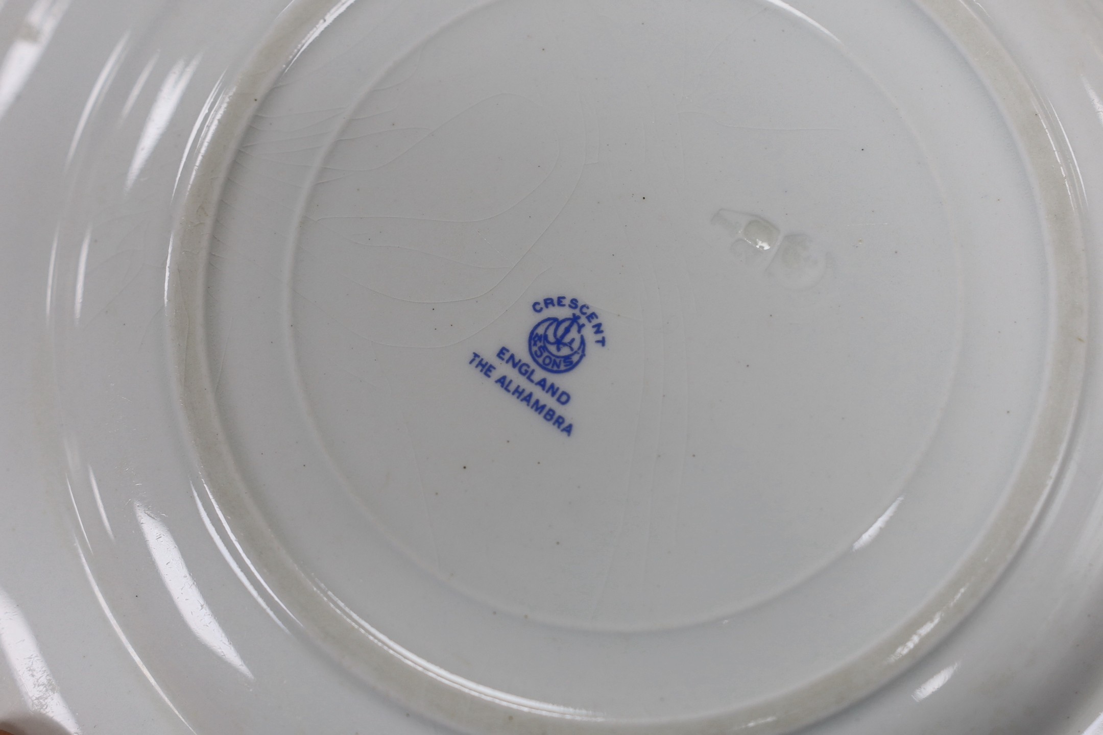 A George Jones crescent china Alhambra pattern dinner service